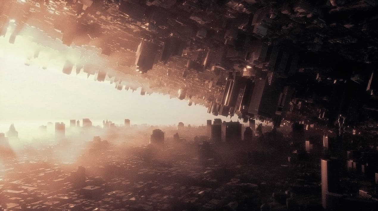 3D render of a city skyline folding downward at its center, lit by warm orange light.