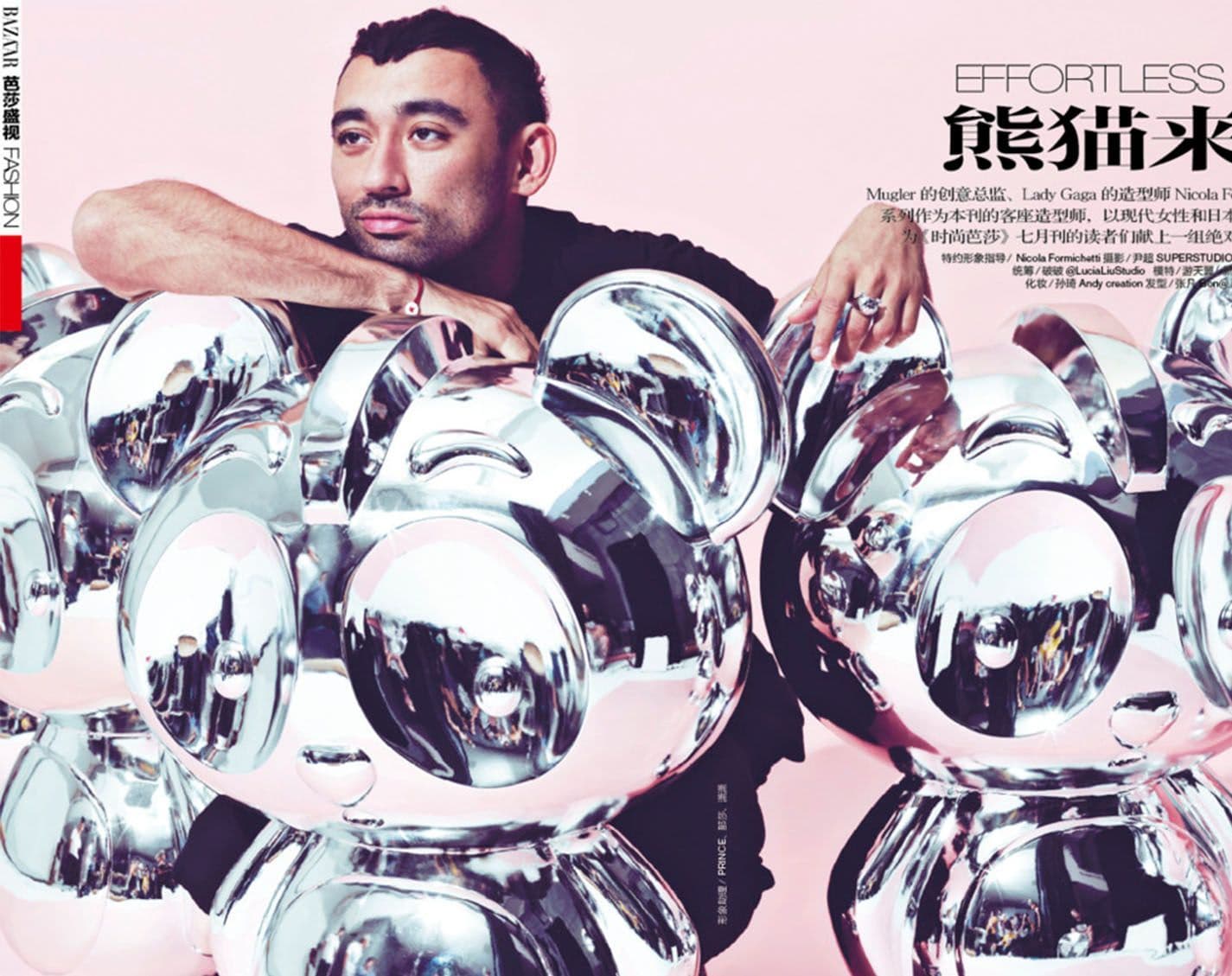 Magazine editorial photo of a man reclining amid a cluster of silver mirrored disco balls, with Chinese and English text overlay.