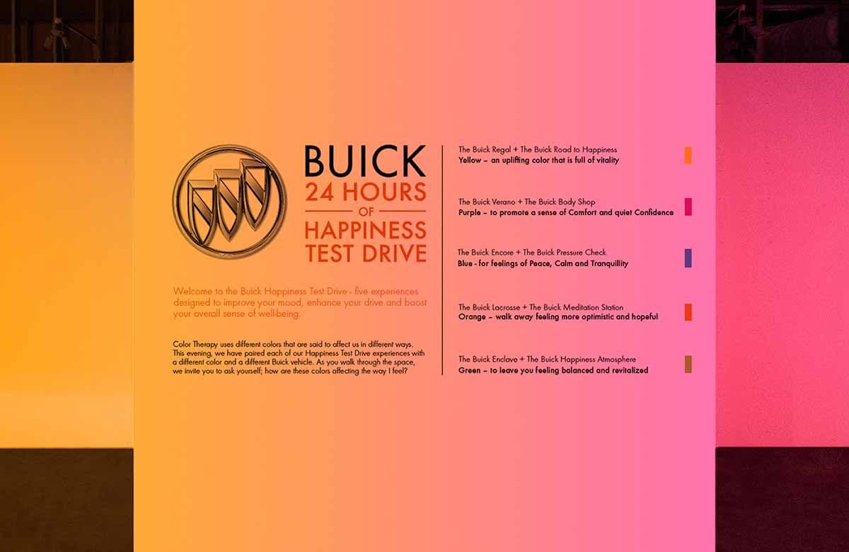 An informational panel describing the Buick "24 Hours of Happiness" color-therapy test drive concept, with a list of Buick models paired with colors and their associated moods.