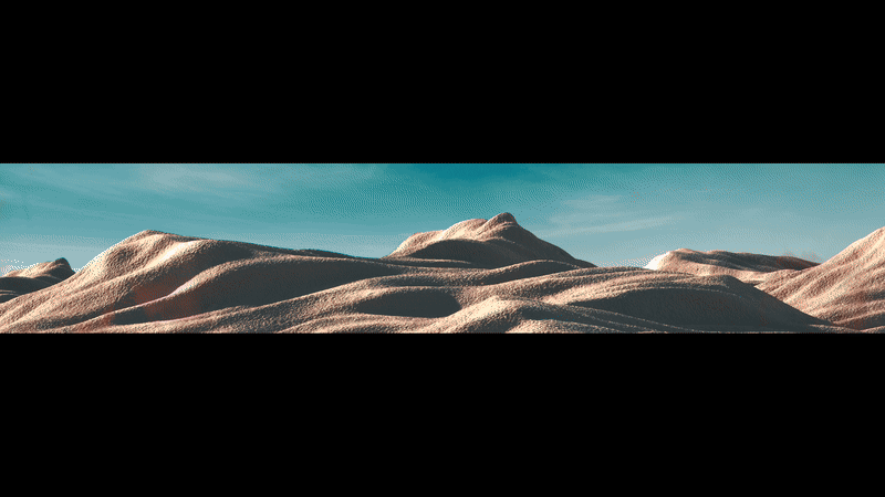 Panoramic still of sand dunes under a teal sky, used as desert landscape imagery in the installation.
