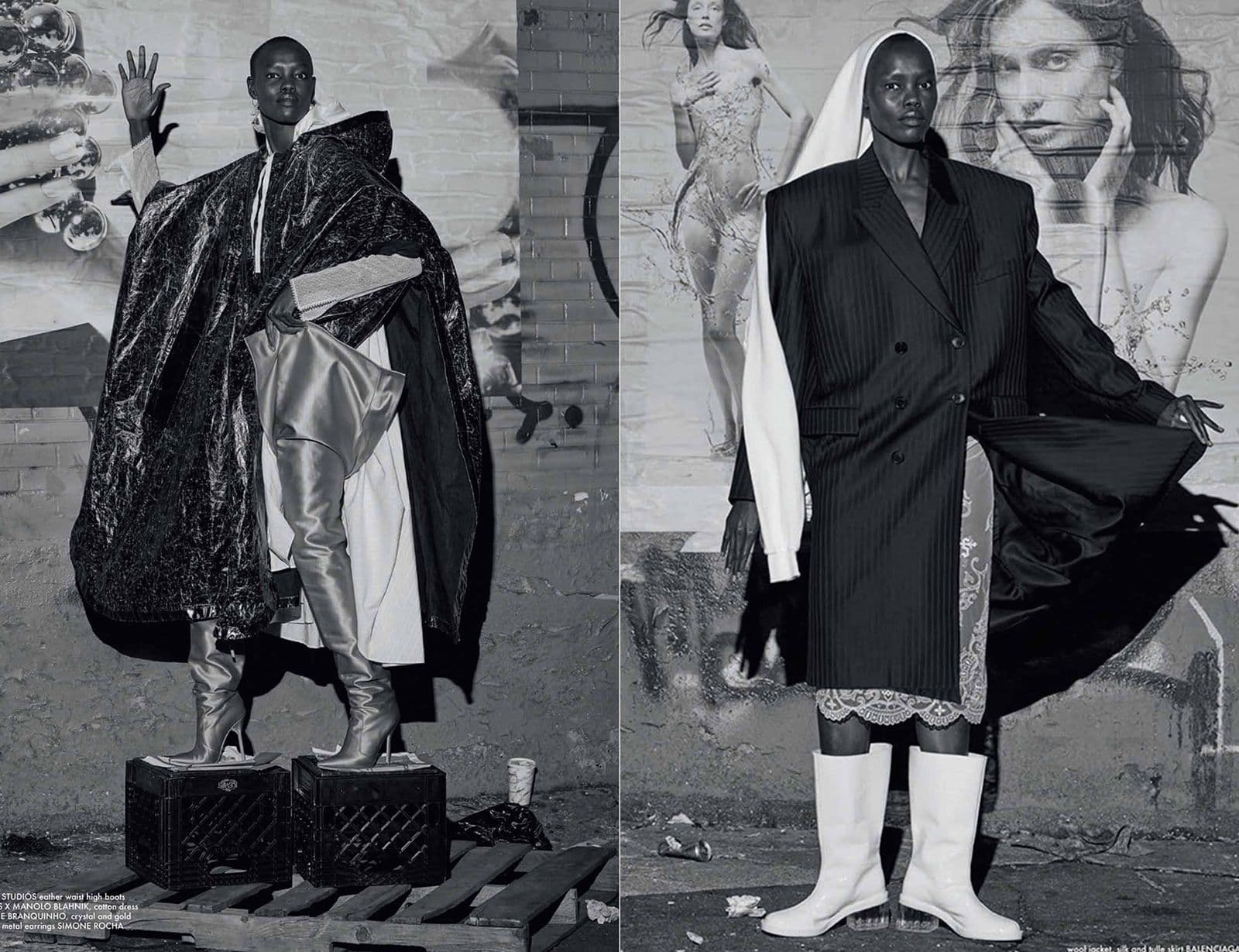 Black-and-white editorial diptych: a model in a glossy black cape and metallic thigh-high boots stands on wooden crates, beside a model in an oversized pinstriped blazer-coat and white boots posing in front of a mural of fashion portraits.