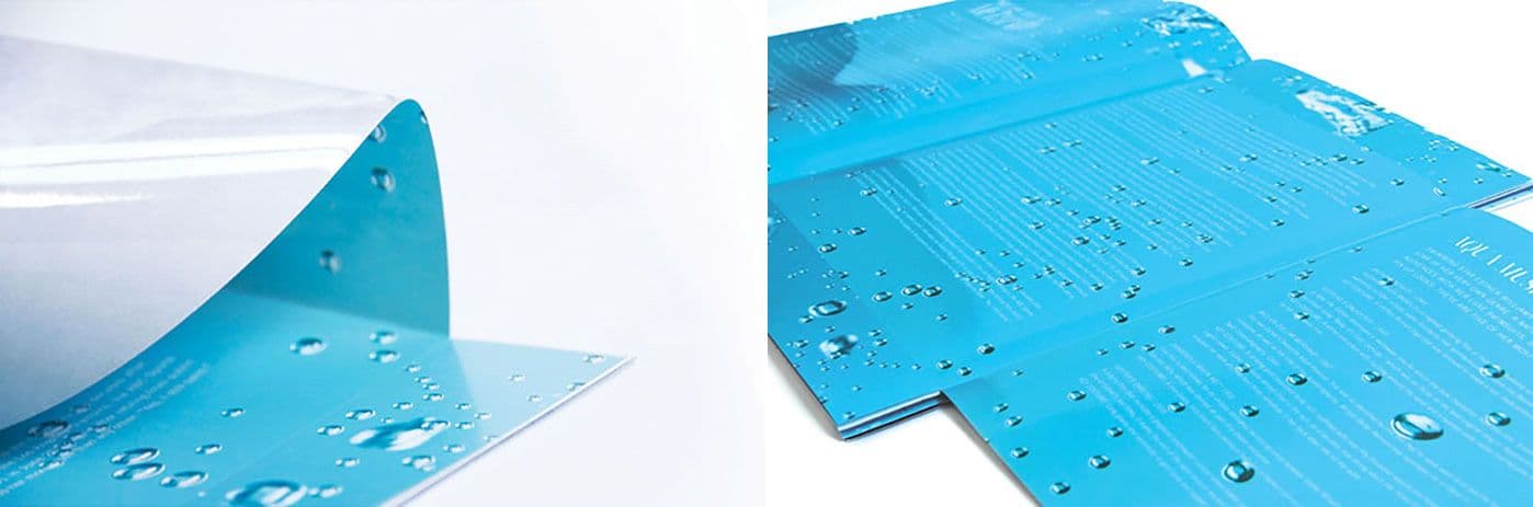 Two views of a blue catalog page printed with water droplets, one curling up to reveal the page underneath and one laid flat showing columns of text.