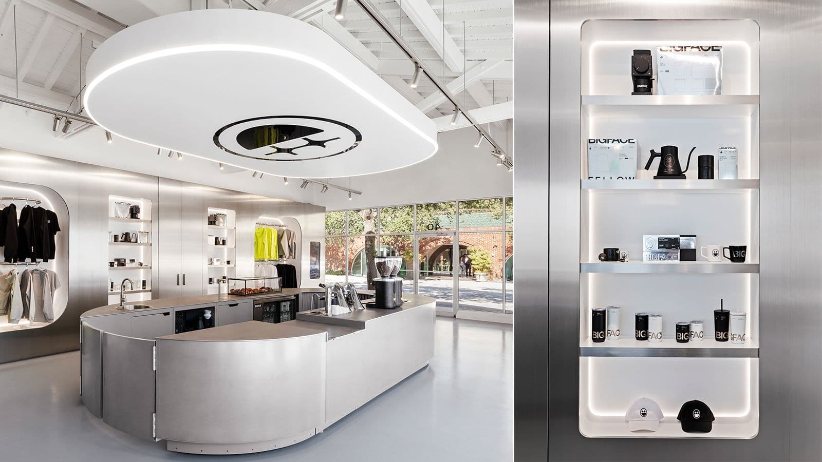 Store interior view of the oval ceiling light, curved counter, and clothing racks
