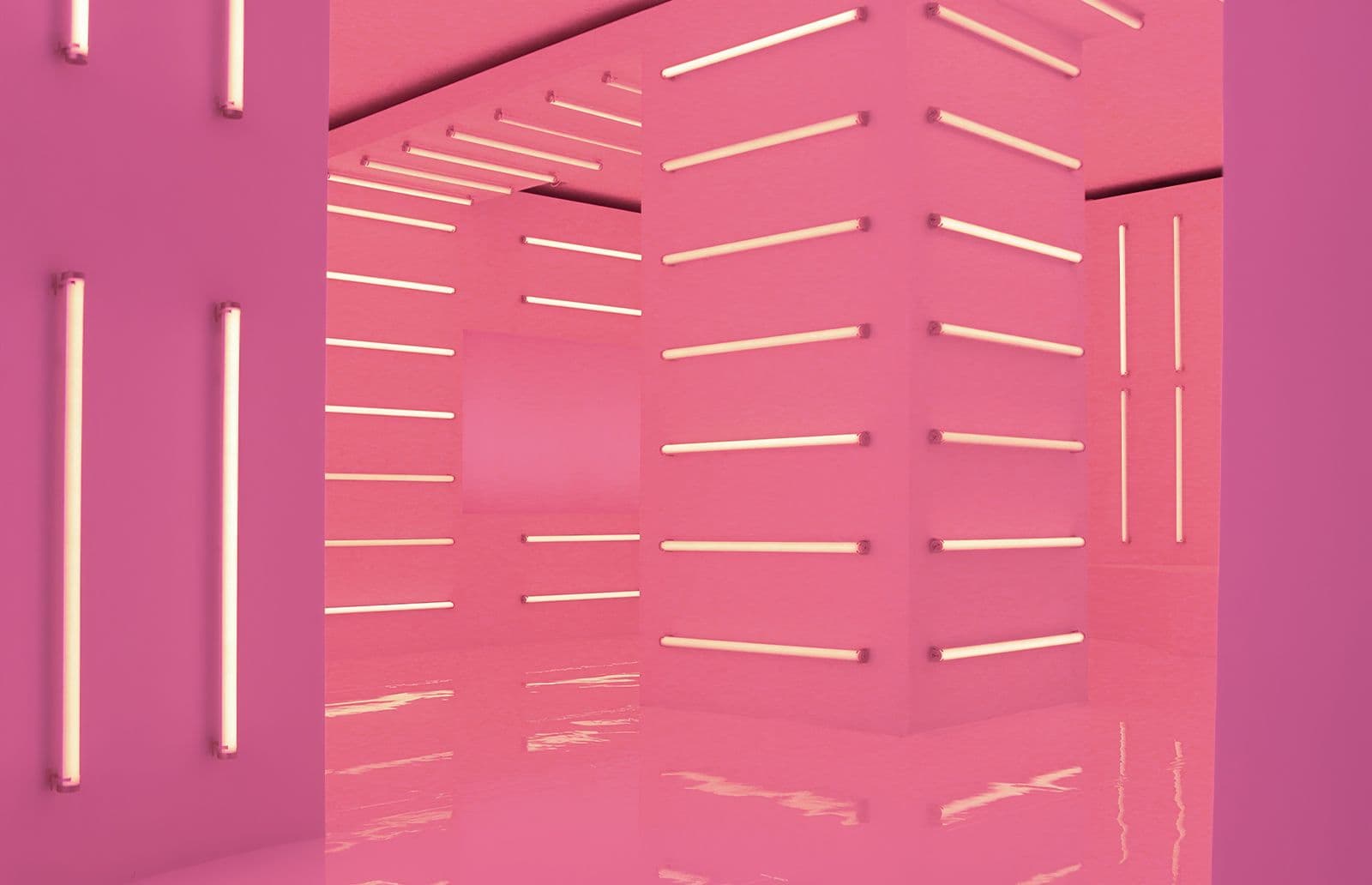 Hot-pink room with diagonal and vertical neon light strips.