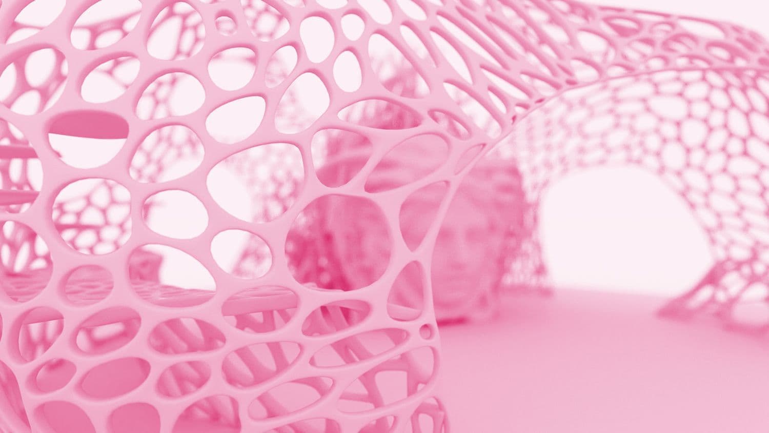 Close-up looking through the perforated lattice shell with the pink Medusa head sculpture visible blurred in the background.
